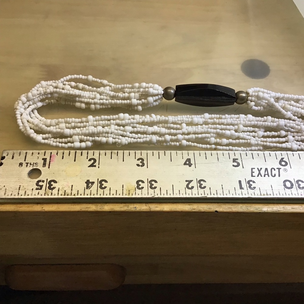 Silpada Beaded necklace with two large beads name brand on clasp on back.